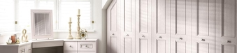 White fitted wardrobe and bedroom storage