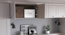 Over bed fitted storage cupboards