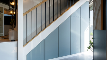 light blue modern understairs storage