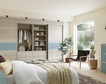 Fitted bedroom furniture in driftwood and fjord blue finish